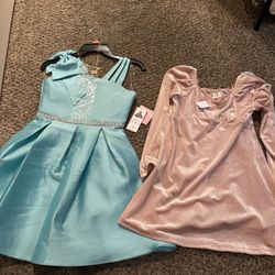 Girl Dresses New (size 6/7) With Tags Take Both For $20