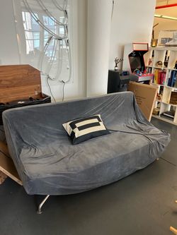 Couch / Futon with cover