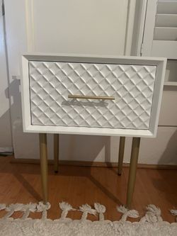 White bedside table