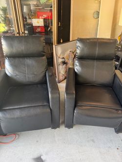 Pair of Black Faux Leather Recliner Chairs