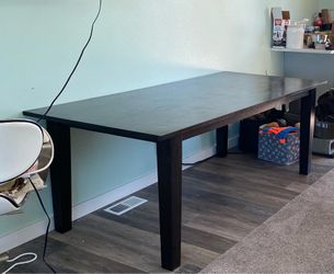 Crate & Barrel Basque 82” honey brown solid wood dining table