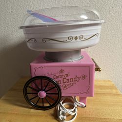 Two Cotton Candy Machines And a Popcorn Machine 