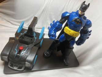 Fisher-Price Imaginext DC Super Friends Bat-Tech Batmobile transforming And Batman.