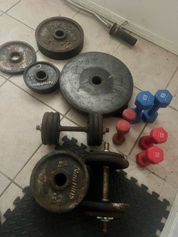 Olympic weight plates and curl bar