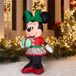 Gemmy Disney 5ft Xmas Minnie Mouse Holding Gift Airblown Inflatable Original Box. Box has wear and tear. Missing ground stakes. This item is a Disney 