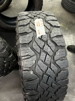 1 SEMI NEW LT 28570R17 Goodyear Wrangler All Terrain tire for $100 installed and balance. 285/70/17 285/70/R17 285 70 R 17 285 70 17 28570R17 Tread