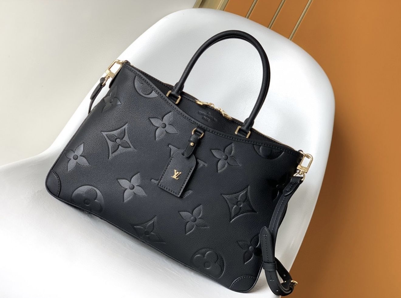 Louis Vuitton black monogram embossed leather bag