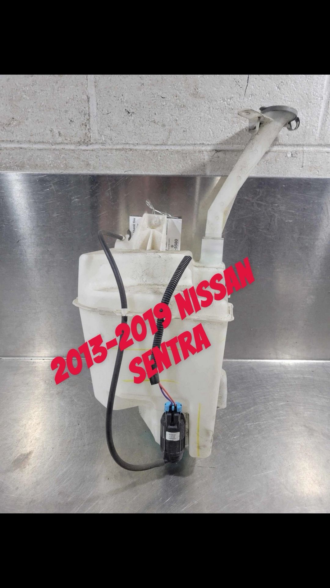 Nissan Sentra Washer Fluid Reservoir With Pump. Have Coolant And Washer Reservoirs For All Makes And Models.