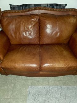 Genuine leather love seat very good condition