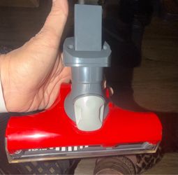 This is a New Dirt Devil replacement vacuum nozzle, specifically a red-colored attachment https://offerup.com/redirect/?o=aGVhZC5JdA== is designed for