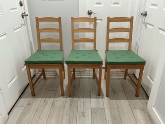3 wood chairs
