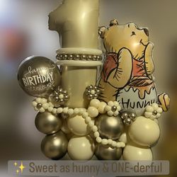 Sweet as hunny 🐻🍯  Beautiful neutral Winnie the Pooh balloon stack perfect for a 1st birthday celebration! This setup includes:  • Large gold number