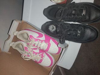 2 Pairs Of Nikes