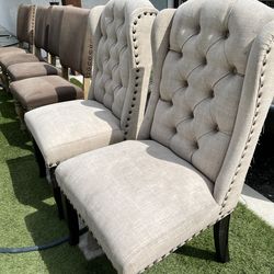 6 upholstered chairs plus Free table