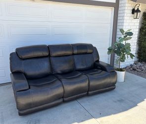 $1600 Genuine leather power reclining sofa
