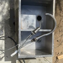 Stainless Steel Sink And Delta Faucet