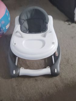 Baby walker/rocker with table