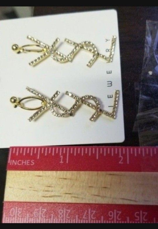 YSL YVES SAINT LAURENT LARGE GOLD TONE EARRING