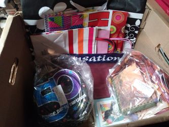 Box of gift bags, table cloths, plates/napkins