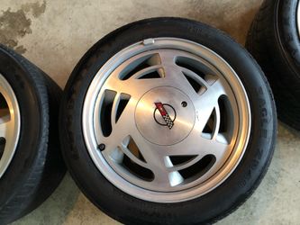 4 near perfect Corvette Wheels 1(contact info removed) with tires and center caps