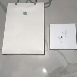 AirPod Pros with Apple Bag