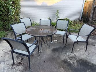 Cast iron chairs and table