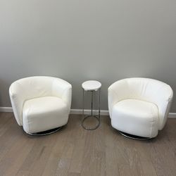 2 Leather Swivel chairs