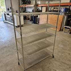 Rolling metal rack with 6 adjustable shelves and shelf liners

$150 FIRM

LAST ONE 