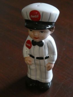 Vintage 1990's coca cola delivery man with cart salt and pepper shakers also gas pump salt and pepper shakers never used located in palm springs ca pe