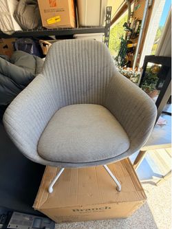 2 swivel chairs Grey new/used.