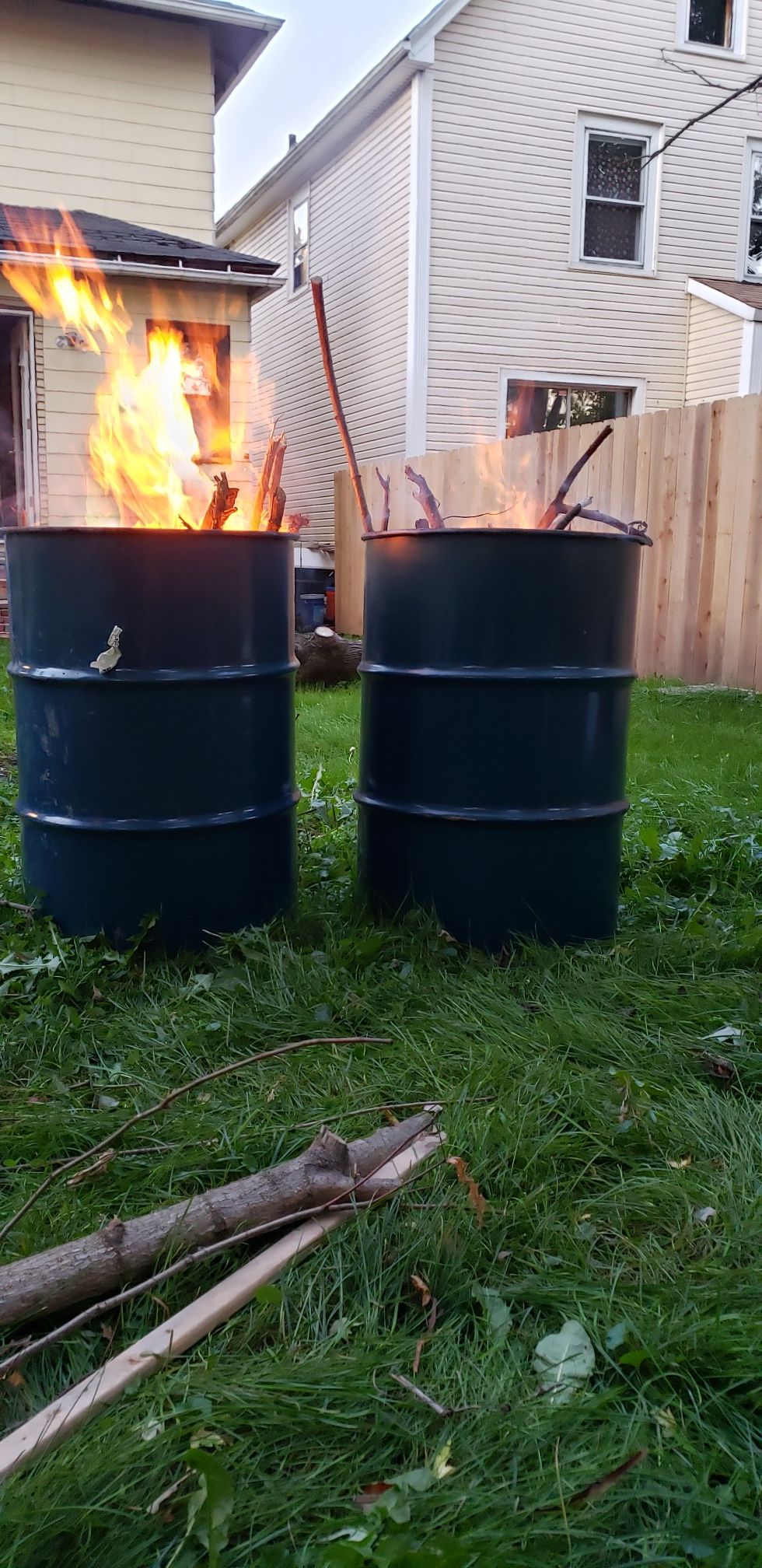 Brand new 55 gallon barrels with tops
