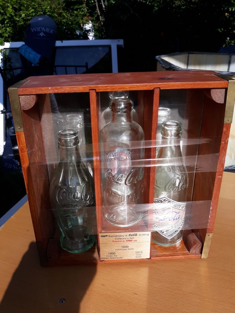Coke coca cola antique bottle collection reissue