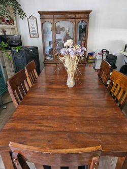 Wood dinning table and matching hutch