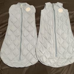 2 new dreamland baby sleep sacks. Each retail for 109.99.   Wife bought these for our baby and never used them. Check out photos for further details a