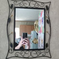 Black metal decorative mirror home office decor. Measurements are 18x14. 