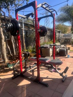 OLYMPIC SQUAT RACK WITH OLYMPIC WEIGHTS