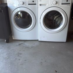 LG washer and dryer stackable or side-by-side one year and six months old in fantastic condition