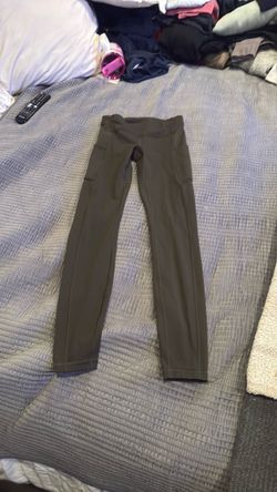 Women’s Lululemon olive running pants leggings size 4