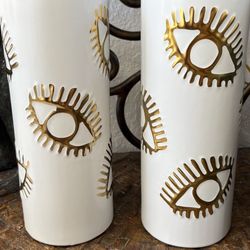 $30 Each. Lucky Hamsa Eye Lashes Vase.  2 For Sale Buy 1 Or Pair.  Wicker Stool Or Child’s Rattan Chair Seat Plant Stand $25 Each.  