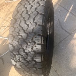 Single Tire GENERAL GRABBER A/T 275/70R18 116S. Has one patch