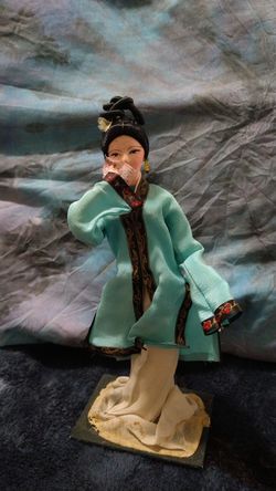 Antique Geisha Doll.