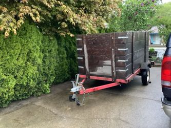 SOLID WOOD WITH FOLD DOWN RAMP IN BACK, FOR EASY LOADING.