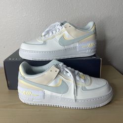 Nike Air Force 1 Shadow trainers in white and light blue