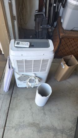 AC Unit/ remote / Wall tubes included