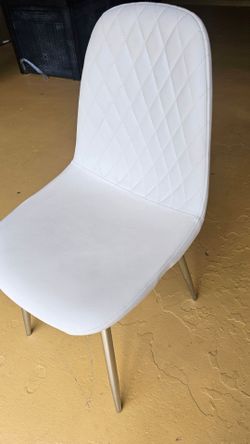 6 white chairs