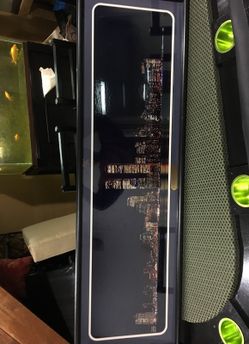 Framed picture of lower Manhattan twin towers night view