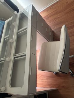 Vanity with mirror and chair