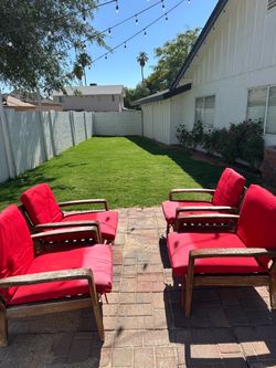 4 wood chairs and cushions