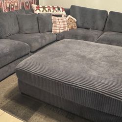 Grey Sectional And Ottom