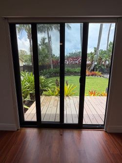 Modern Hurricane Impact Sliding Glass Door â€“ Black Frame
